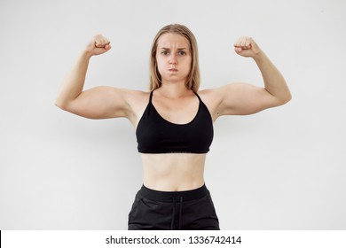 Girl Shows Big Biceps