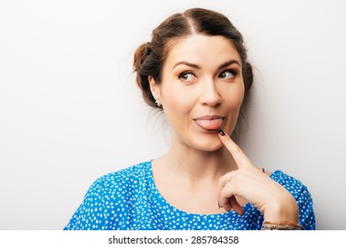 Girl Shows Finger On Tongue Stock Photo 285784358 | Shutterstock