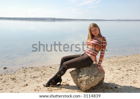 Similar – Young woman and Labrador at the Baltic Sea beach