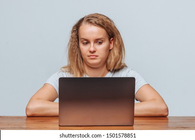 The Girl Sits At The Computer And Not Understand