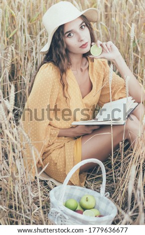 Similar – Image, Stock Photo Young redhead woman reading a red book