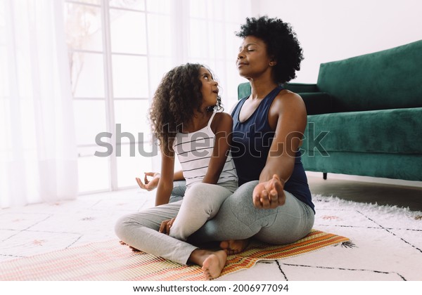 Girl Sitting Lap Mother While She Stock Photo 2006977094 | Shutterstock