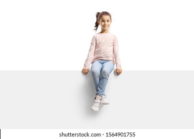 Girl sitting on a blank banner isolated on white background