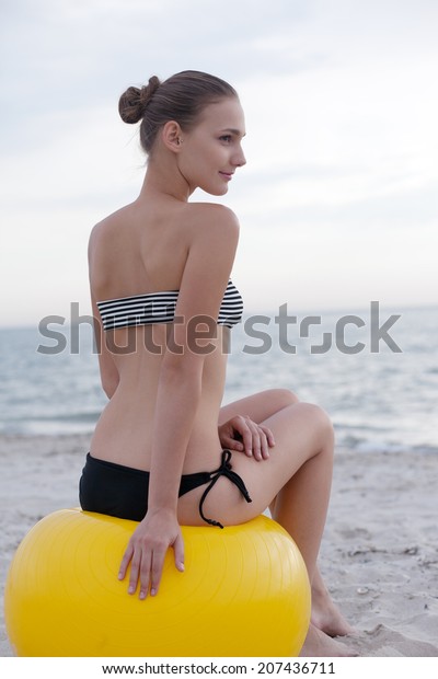 sitting on yoga ball