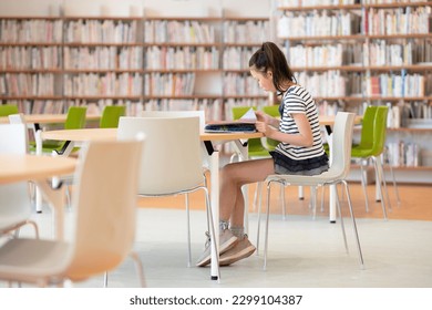 girl sitting and reading a book - Powered by Shutterstock