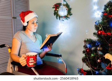 girl sitting in wheelchair reading book and drinking tea near christmas tree, new year sweaters, wheelchair, new year gifts, new year gifts, ornaments, string lights, tinsel, put up a christmas tree,  - Powered by Shutterstock