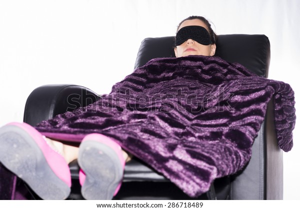 Girl sleeping on a\
couch.