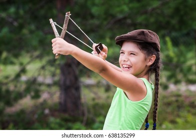 Girl With Slingshot