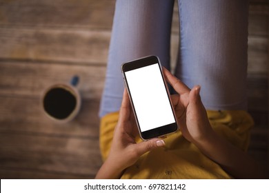 Girl with a smart phone with copy space