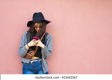 Girl With Smartphone On Street