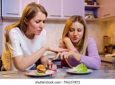 Girl Sneaking Food From Friends  Plate, Diet Concept, Funny Diet Concept 