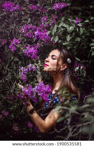 Similar – Woman posing in field of white flowers