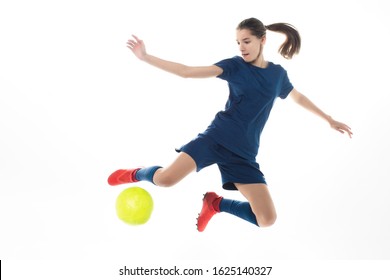 girl soccer player kicking ball isolated over white background - Powered by Shutterstock