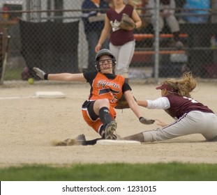 Girl Softball Player Sliding Into 2nd Base