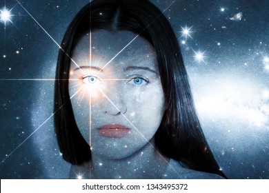 A girl with a soulful look against the background of a starry sky. Sparkling look. The concept of paranormal abilities, clairvoyance, mysticism. Elements of this image furnished by NASA