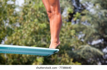 Girl Standing On Diving Board