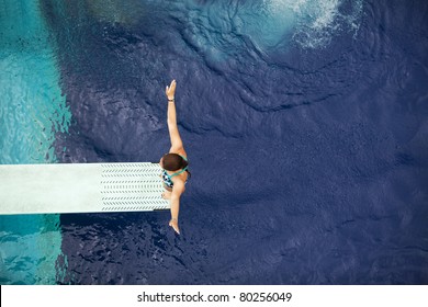 Girl Standing On Diving Board