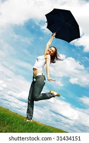  Girl Standing On Meadow With Umberella