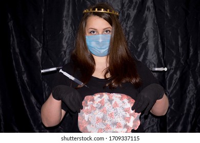 A girl stands on a black background with gloves and a crown on her head. Syringes are injected into it with a vaccine that does not kill the virus. The girl portrays the coronavirus as an invulnerable - Shutterstock ID 1709337115