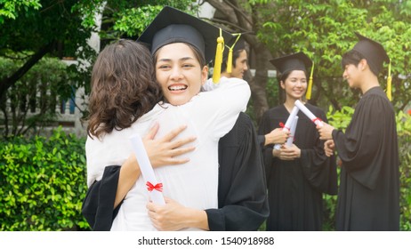 Girl Student Graduation Gowns Hat Hug Stock Photo (Edit Now) 1047454087