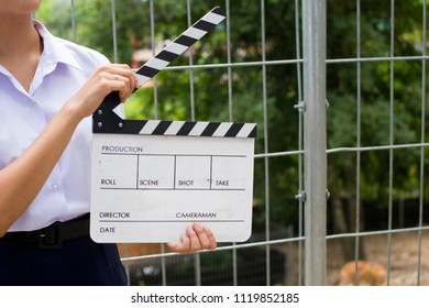 Girl Student Hold Movie Clapper Board