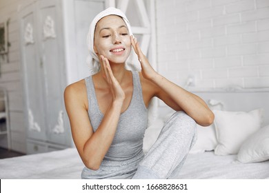 Girl In A Studio. Lady With Cream. Woman In A Gray T-shirt.