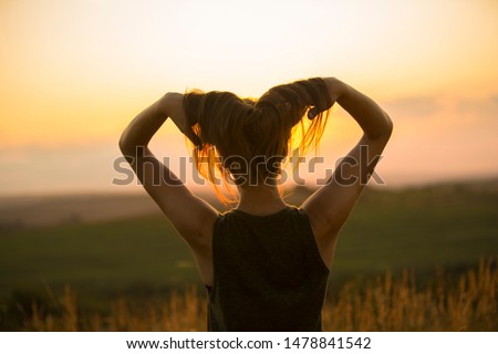 Similar – Image, Stock Photo Woman, both hands in the hair, back view