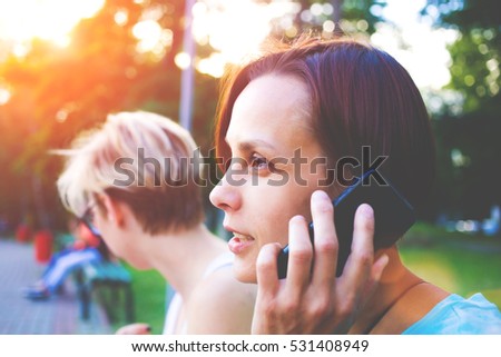 girl talking on the phone, portrait of young woman.