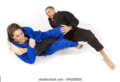 Girl Tapping Man Out With Jiu Jitsu Grappling Submission