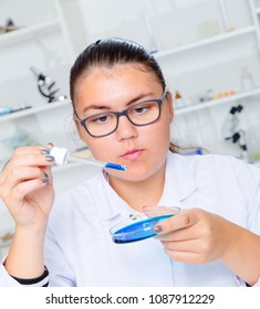 Girl Teen In The Laboratory Of Food Quality Tests.