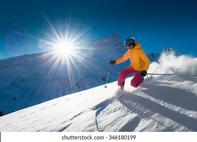 Girl telemark skiing snow slope in mountains