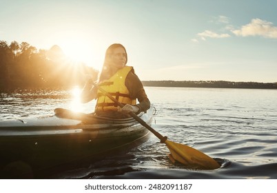 Girl, thinking and outdoor on lake or kayak or water sports, rowing and river journey on summer vacation. Woman, canoeing and travel on holiday in nature with sunshine, adventure and paddle for tour. - Powered by Shutterstock