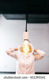 A Girl And Thomas Edison Lightbulb