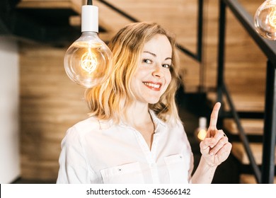 A Girl And Thomas Edison Lightbulb