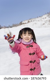 Girl Throwing Snow Ball