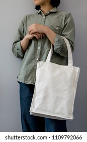 Girl With Totebag On Gray Background