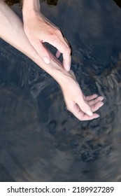 Girl Touch Water, Closeup View