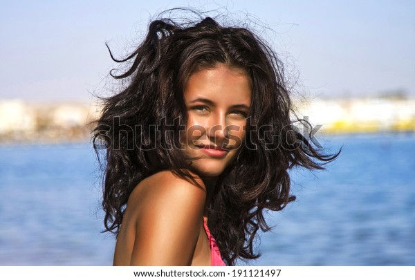 Girl Tousled Hair On Beach Stock Photo Edit Now 191121497
