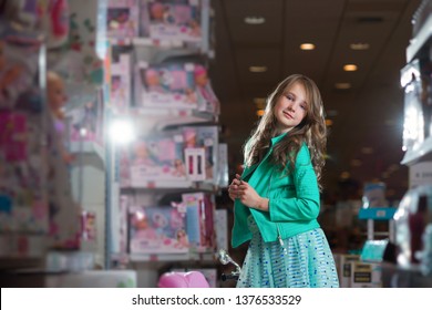 Girl is in the toy store