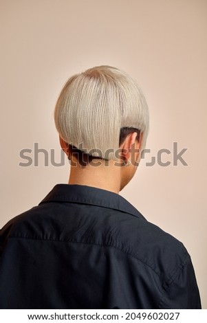 Girl with trendy asymmetrical haircut [[stock_photo]] © 