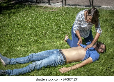 Girl Trying To Find Help For An Unconscious Guy