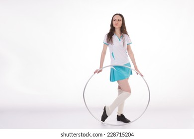 Girl In  T-shirt And Short Skirt With  Hoop