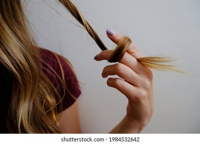 Girl twisting and twirling her hair
