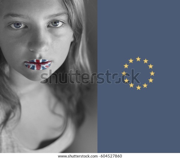 Girl with UK flag painted lips and\
European Union flag stars, Brexit\
representation.