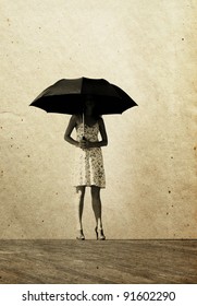 girl with umbrella. Photo in old color image style.