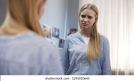 Girl Is Upset Of Static Dry And Damaged Hair In Winter Period, Self-doubt Age