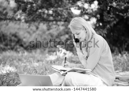 Girl use modern technology for business. Use opportunity digital technology. Modern technology give more opportunities to realize your potential. Woman with laptop and smartphone working outdoors.