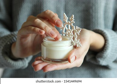 The Girl Uses Cream. Winter Hand Skin Care.