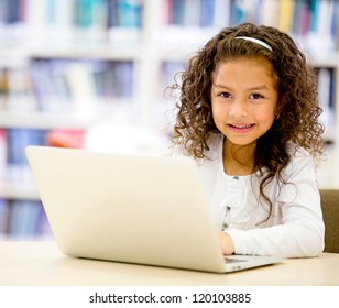 Girl Using A Laptop Computer At School