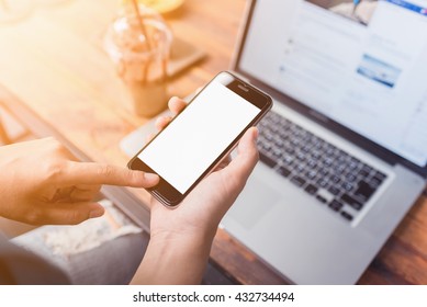 Girl Using Smartphone In Cafe.